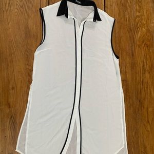 Long sheer sleeveless top.